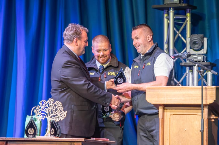 Rob James and Chris ‘Yobbler’ Thomas receiving their Blue Light Awards from Cllr Lawrence Blackhall