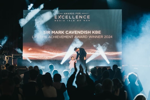 Sir Mark Cavendish KBE with his youngest daughter Astrid after collecting the Lifetime Achievement Award
